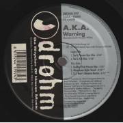 A.K.A. - WARNING ( TEE'S FROZEN SUN MIX - TEE'S A.B MIX - RUBBER DUB HOUSE MIX - MAXIMUM STYLE VOCAL - DJ RON'S GROOVE REMIX )